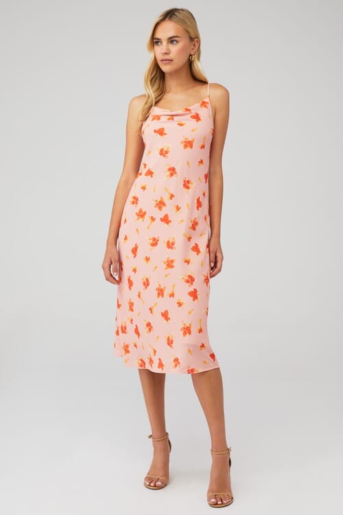 Experience effortless style with RESA's Berri Slip Dress in vibrant Floral Punch design.
